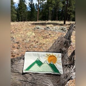 Hand crafted mountain theme  Embroidered pouch
Are the mountains calling you ?